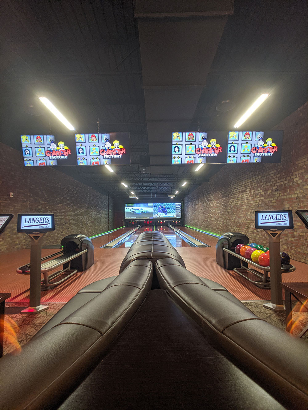 Private bowling lanes with projection screens