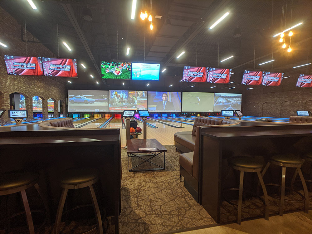 Bowling lanes with VersaLamps and projection systems